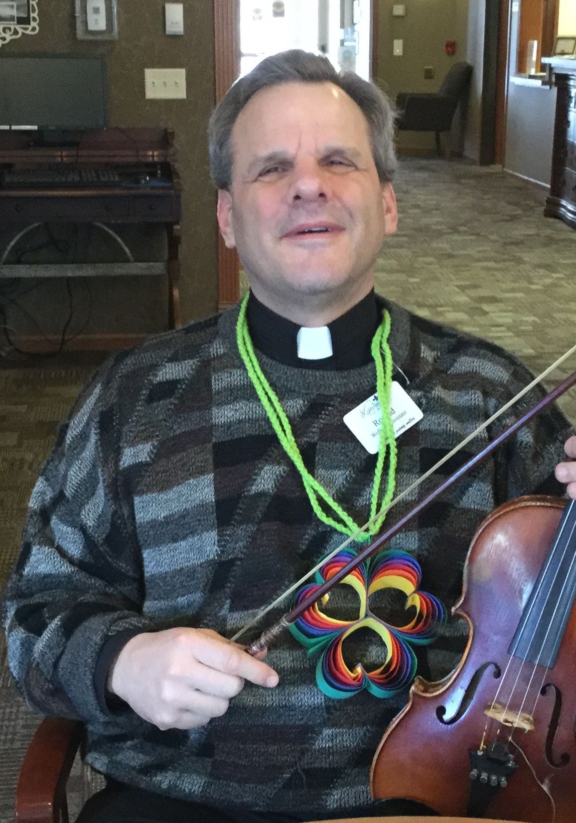 Father Ron pictured with a violin